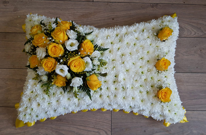 Pillow funeral flowers Bristol florist FPI7