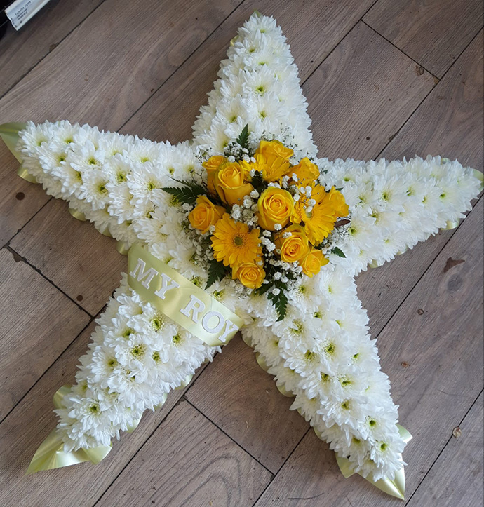 Star shape funeral flowers Bristol florist FST5