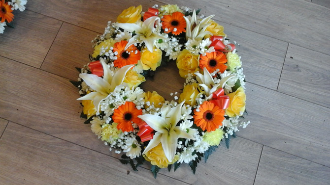 Funeral wreath orange white yellow Bristol florist FW2