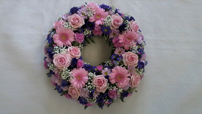 Funeral wreath pink white blue flowers florist Bristol FW3
